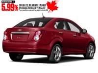 2012 Chevrolet Sonic 4dr Sdn LS Crystal Red Tintcoat  Shot 2