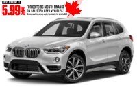 2018 BMW X1 xDrive28i Sports Activity Vehicle Mineral White Metallic  Shot 4