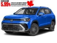 2026 Volkswagen Taos Comfortline 4MOTION Cornflower Blue  Shot 4